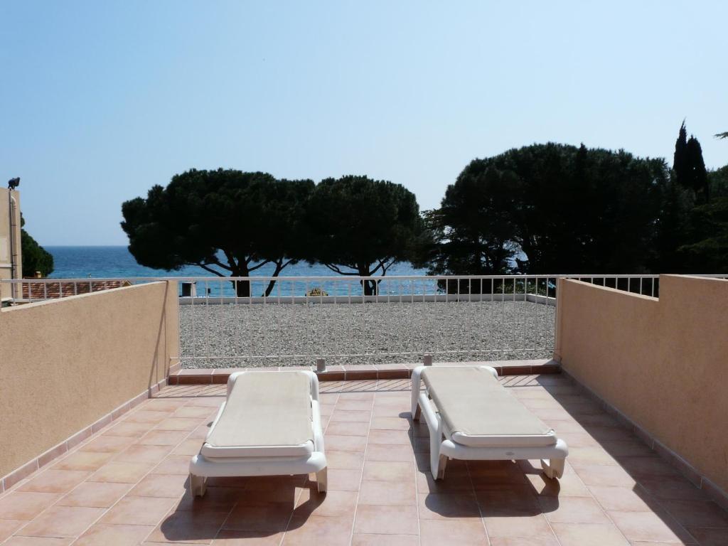 Hotel De La Plage Le Lavandou Quarto foto